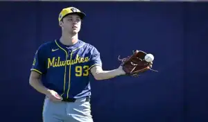 Milwaukee Brewers player warms up before game against St. Louis Cardinals, June 12th 2025