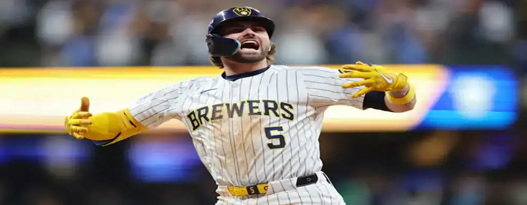 Milwaukee Brewers vs Colorado Rockies Picks and Predictions June 28th 2025 3 Milwaukee Brewers player shouting and spreading arms wide in celebration during home game