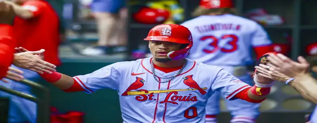 Cleveland Guardians vs St. Louis Cardinals Picks and Predictions June 28th 2025 2 St. Louis Cardinals player receiving high fives in the dugout after scoring a run