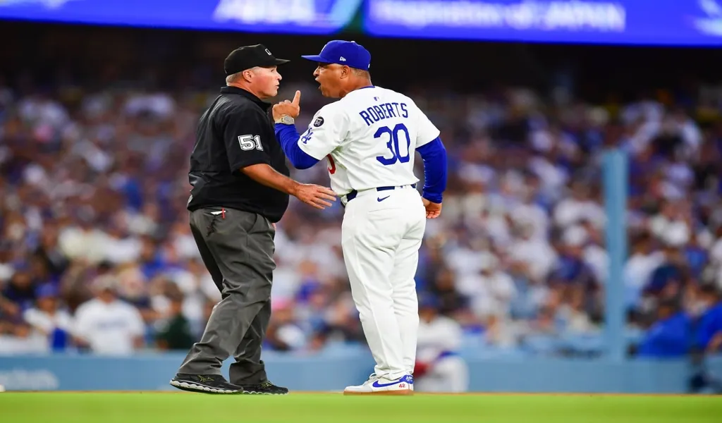 Dodgers manager arguing with umpire during Padres game, June 18, 2025