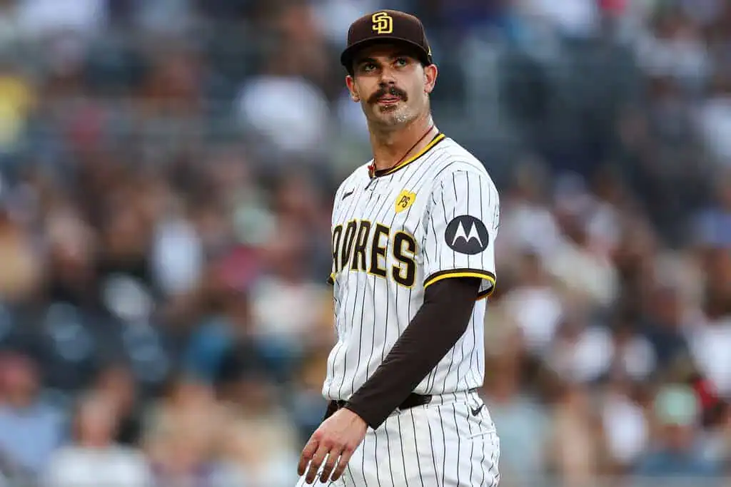 San Diego Padres vs Los Angeles Dodgers Picks and Predictions June 10th 2025 2 A San Diego Padres player stands on the field in a pinstriped uniform, looking focused as the game unfolds behind him.