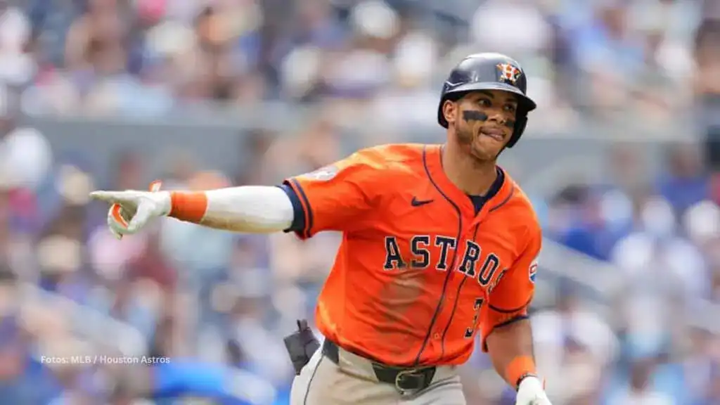 Cleveland Guardians vs Houston Astros Picks and Predictions June 6th 2025 2 A Houston Astros player in an orange jersey celebrates a home run while pointing towards the stands, surrounded by a cheering crowd.