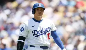Los Angeles Dodgers player prepares to bat against Kansas City Royals during June 28th 2025 game