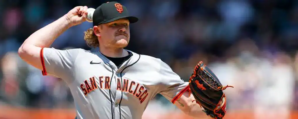 Arizona Diamondbacks vs San Francisco Giants Picks and Predictions June 30th 2025 2 A baseball pitcher in a San Francisco Giants jersey prepares to throw a pitch, showcasing a focused expression and intricate glove details.