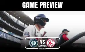 A baseball player in Mariners gear walks through the tunnel, preparing for the game against the Red Sox on June 17, 2025.