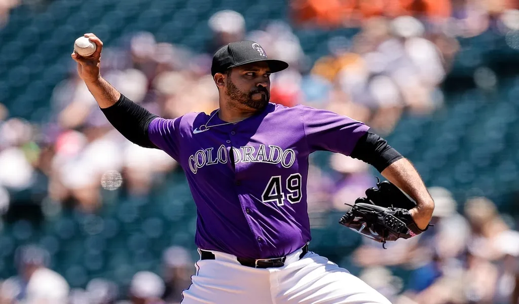 Colorado Rockies pitcher delivers pitch during MLB game vs Milwaukee Brewers June 28th 2025