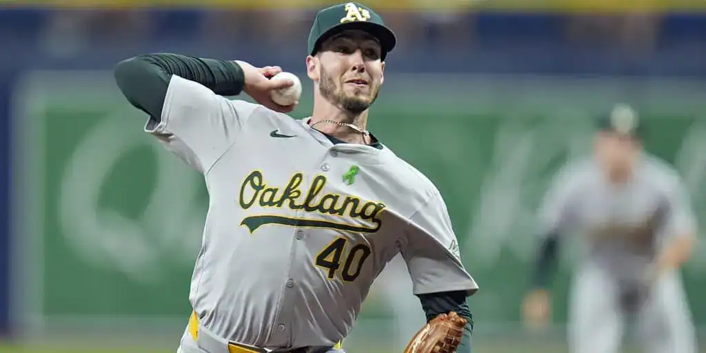 New York Yankees vs Oakland Athletics Picks and Predictions June 27th 2025 2 A pitcher in an Oakland Athletics uniform throws a baseball during a game, showcasing determination and athleticism on the field.