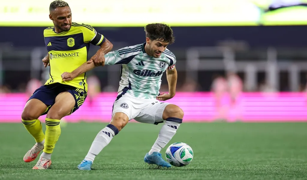 New England Revolution and Colorado Rapids players battle for the ball during MLS match June 28th 2025