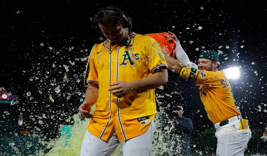 Oakland Athletics players celebrate with post-game ice bath after MLB game against Cleveland Guardians on June 20th 2025