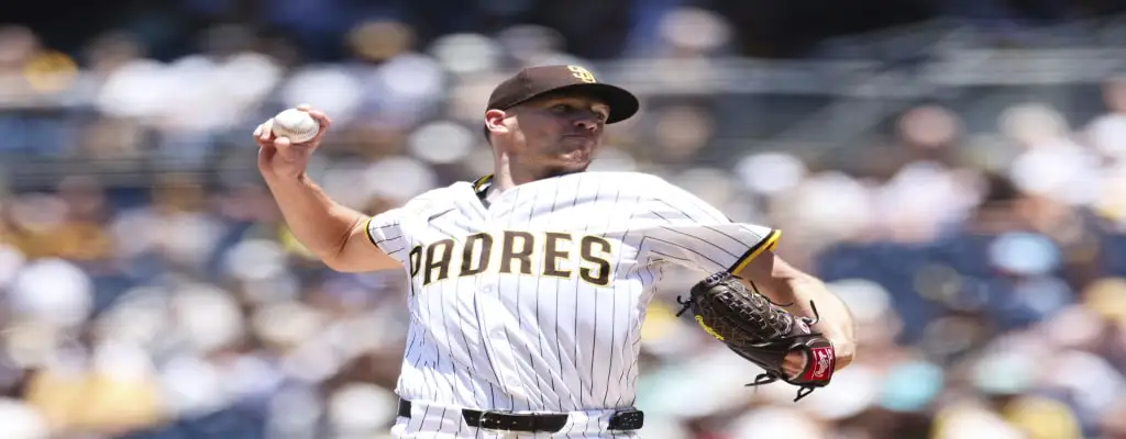 Cincinnati Reds vs San Diego Padres Picks and Predictions June 28th 2025 2 San Diego Padres pitcher mid-throw in bright daylight, wearing white pinstripe jersey