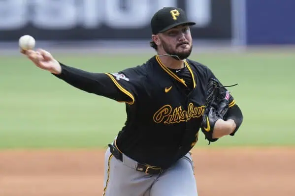 Milwaukee Brewers vs Pittsburgh Pirates Picks and Predictions June 25th 2025 2 A pitcher from the Pittsburgh Pirates is in the middle of a throwing motion, showcasing athleticism on the baseball field.
