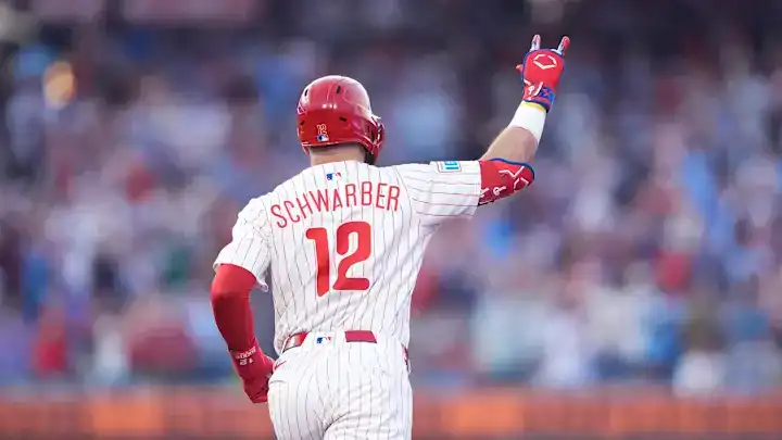 Houston Astros vs Philadelphia Phillies Picks and Predictions June 26th 2025 2 Philadelphia Phillies player Schwarber raises his hand in celebration after a big play