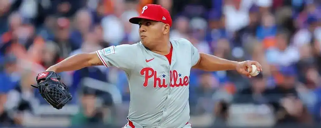 Atlanta Braves vs Philadelphia Phillies Picks and Predictions June 29th 2025 2 A Philadelphia Phillies pitcher prepares to throw a baseball, wearing a gray team uniform and a red cap.