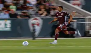 Colorado Rapids player chases the ball during MLS game against Orlando City, June 14th 2025