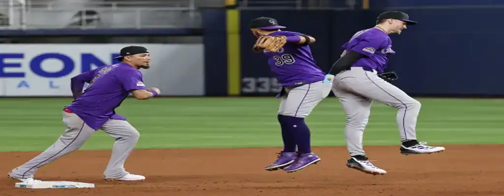 Milwaukee Brewers vs Colorado Rockies Picks and Predictions June 28th 2025 2 Colorado Rockies infielders jump in celebration after an inning-ending play on the field