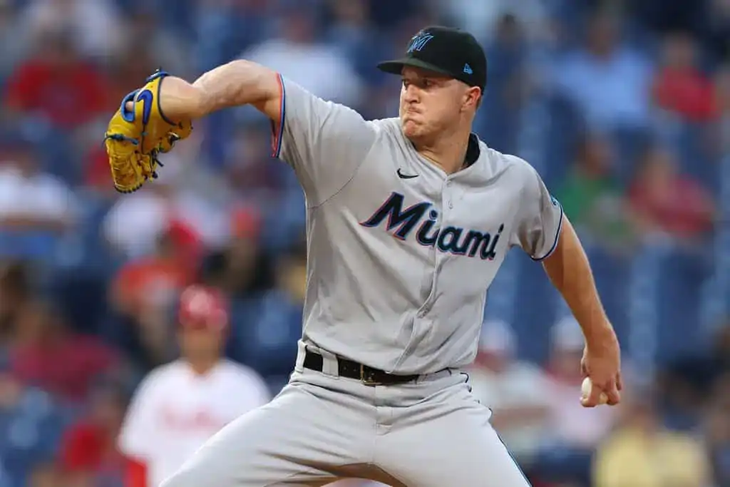 Tampa Bay Rays vs Baltimore Orioles Picks and Predictions June 18th 2025 2 A Miami Marlins pitcher in a gray uniform delivers a pitch during a game, with fans in the blurred background.
