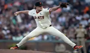 San Francisco Giants pitcher throws a pitch during MLB game against Miami Marlins on June 25th 2025