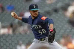 Seattle Mariners pitcher Luis Castillo, number 58, throws a pitch during a game.