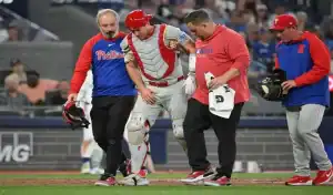 Philadelphia Phillies catcher helped off field after injury during game against Toronto Blue Jays on June 5, 2025