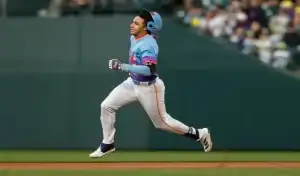 Colorado Rockies player sprints the bases during game against New York Mets on June 7, 2025
