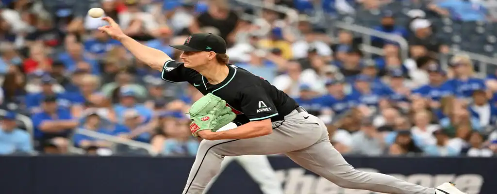 Colorado Rockies vs Arizona Diamondbacks Picks and Predictions June 20th 2025 2 Arizona Diamondbacks pitcher in black uniform throws a pitch during an MLB game