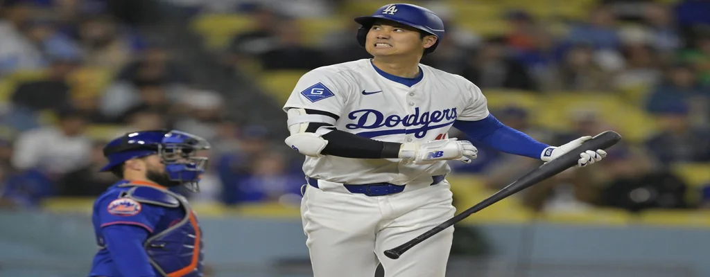 Colorado Rockies vs Los Angeles Dodgers Picks and Predictions June 25th 2025 2 Los Angeles Dodgers player in white uniform reacts during an MLB game