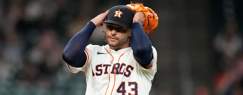 Cleveland Guardians vs Houston Astros Picks and Predictions June 8th 2025 2 Houston Astros pitcher adjusting his cap on the mound during an MLB game, June 2025