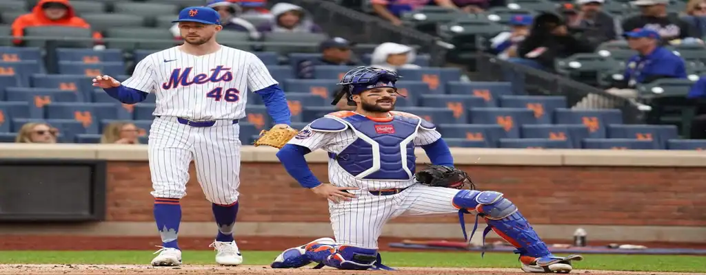 Philadelphia Phillies vs New York Mets Picks and Predictions June 20th 2025 2 New York Mets players in white pinstripe uniforms during an MLB game