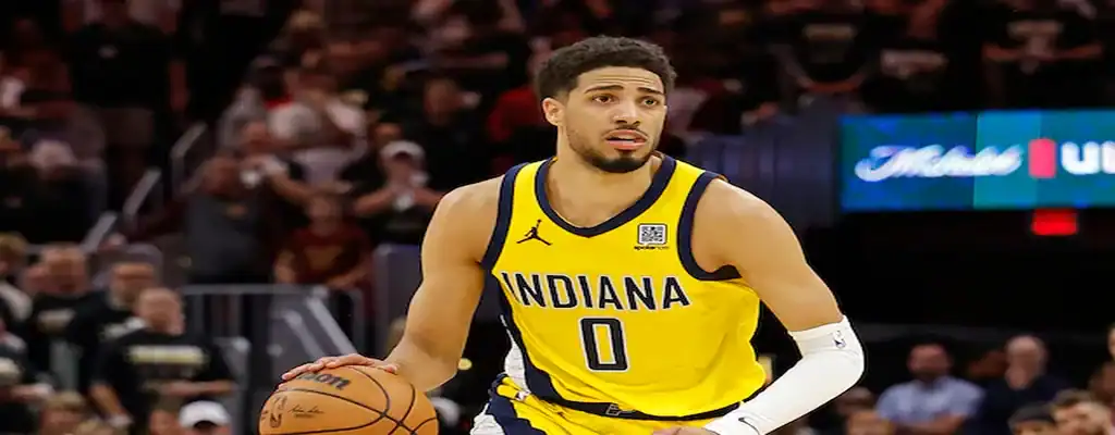Indiana Pacers vs Oklahoma City Thunder Picks and Predictions June 13th 2025 3 Indiana Pacers player in yellow uniform dribbles the ball during an NBA game