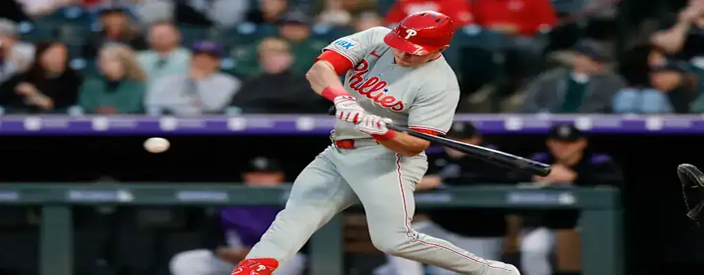 Pittsburgh Pirates vs Philadelphia Phillies Picks and Predictions June 8th 2025 2 Philadelphia Phillies player making contact with the baseball during an at-bat