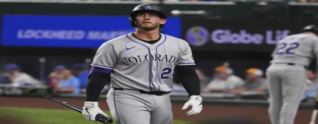 Colorado Rockies batter standing at the plate during an MLB game, holding a bat