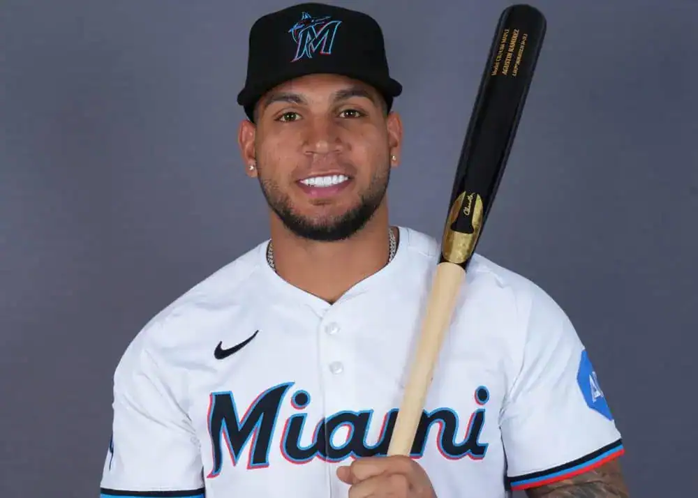 Miami Marlins vs Milwaukee Brewers Picks and Predictions July 6th 2025 2 A man named M Miani is holding a baseball bat. He is dressed in a baseball uniform, complete with a cap and glove