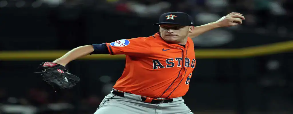Houston Astros pitcher delivering a powerful pitch during a game