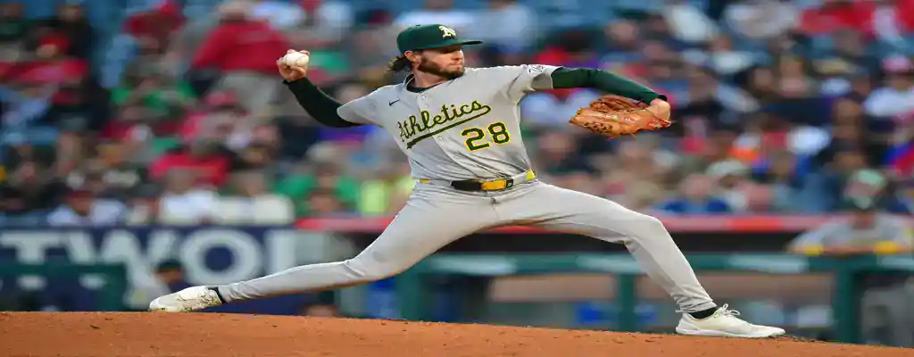 Oakland Athletics vs San Francisco Giants Picks and Predictions July 4th 2025 3 Oakland Athletics pitcher in full stride delivering a pitch on the mound