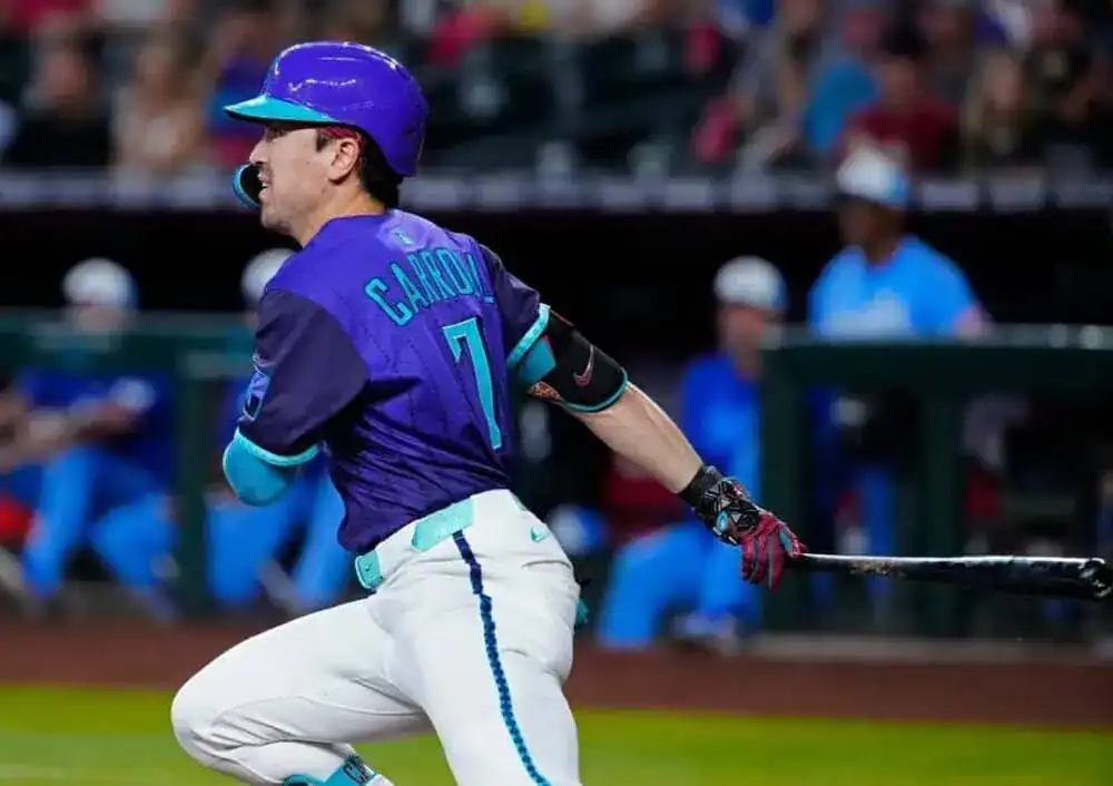 The image features a baseball player swinging a bat, showcasing athleticism and skill in the sport.