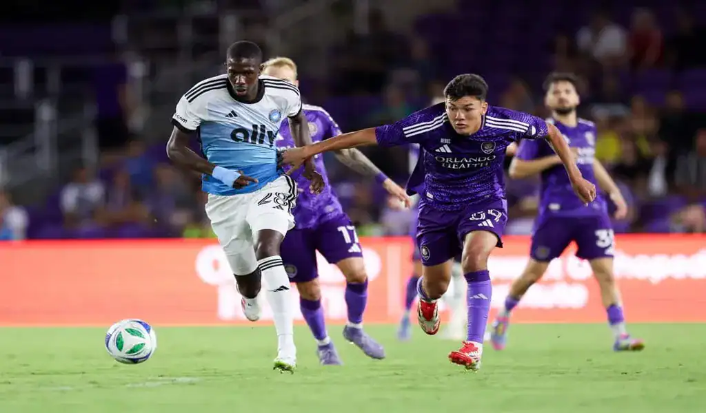 Charlotte FC and Orlando City players in action during the soccer match