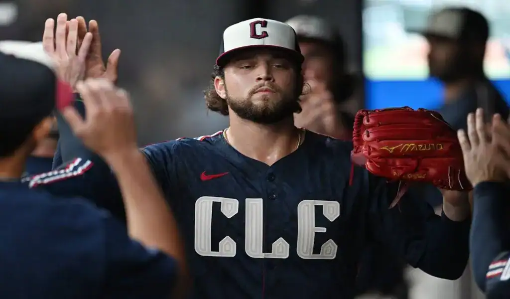 Cleveland Guardians player celebrates in dugout during game vs Rockies July 28 2025
