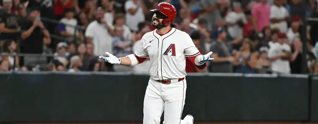 Arizona Diamondbacks player reacting after a key play during a game