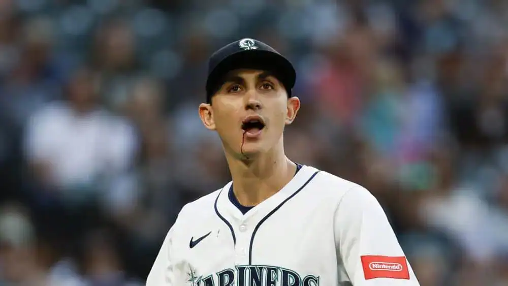Seattle Mariners vs Pittsburgh Pirates Picks and Predictions July 6th 2025 2 The image features a man wearing a baseball uniform. He is likely participating in an athletic game, possibly at a baseball park or stadium