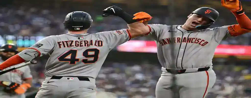 Oakland Athletics vs San Francisco Giants Picks and Predictions July 4th 2025 2 San Francisco Giants players celebrating a big moment at home plate