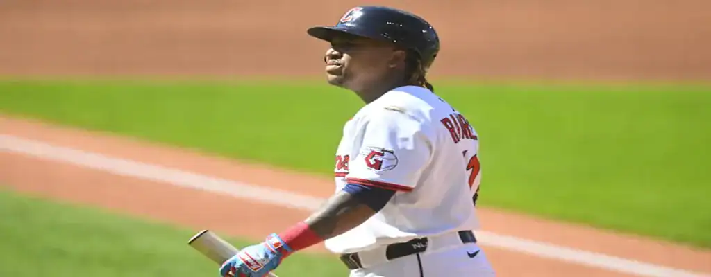 Cleveland Guardians vs Baltimore Orioles Picks and Predictions July 21st 2025 3 Cleveland Guardians player holding a bat during a baseball game