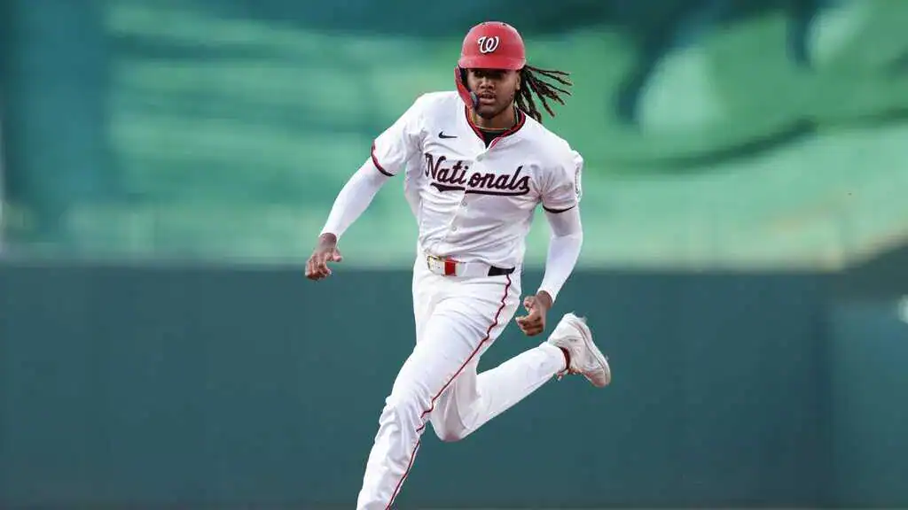 Washington Nationals player James Wood runs the bases during a game.