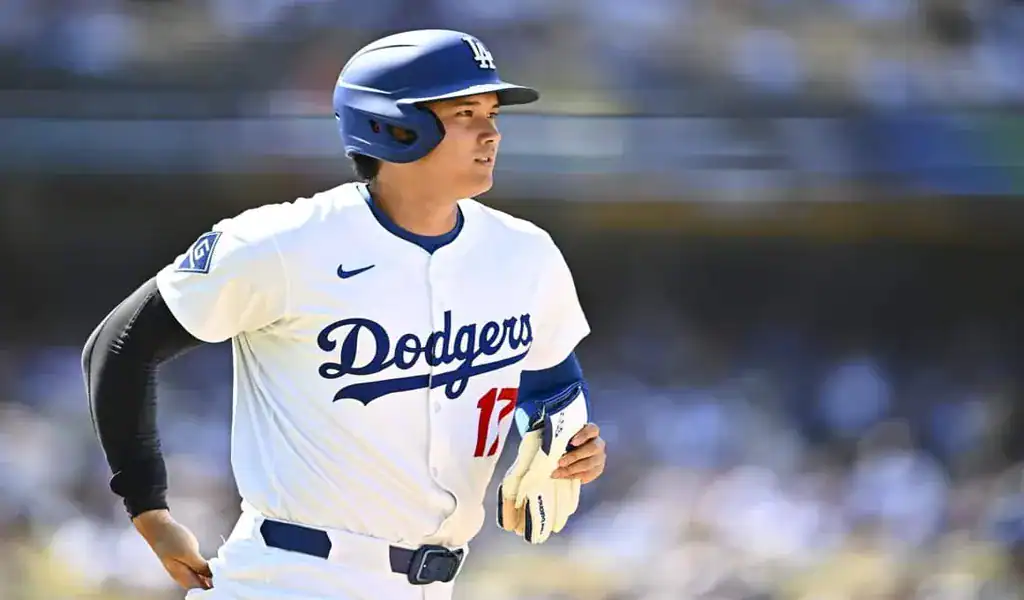 Los Angeles Dodgers player focused while running the bases during a matchup against the Minnesota Twins