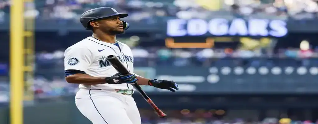 Seattle Mariners player preparing with a bat during a game