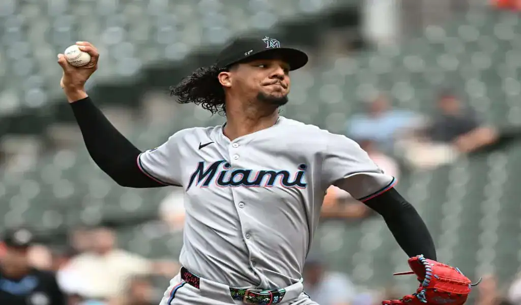 Miami Marlins pitcher delivering a pitch during a matchup against the San Diego Padres