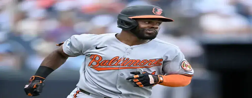 Baltimore Orioles player sprinting towards base during a game