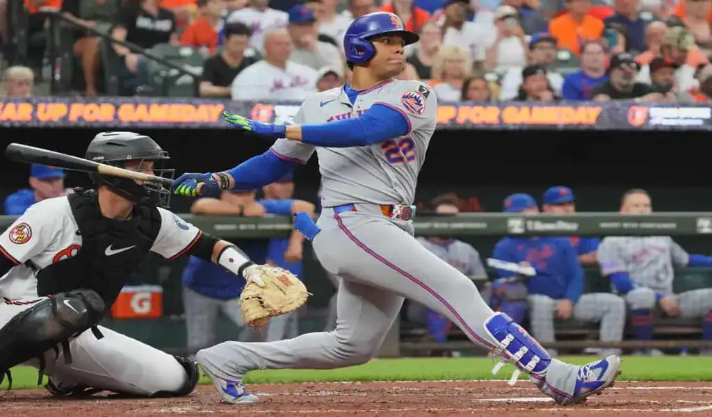 New York Mets batter swinging at the plate during a game against the Baltimore Orioles