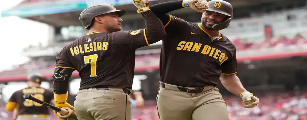 Miami Marlins vs San Diego Padres Picks and Predictions July 21st 2025 2 San Diego Padres players celebrating after a successful play