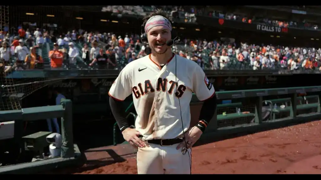 San Francisco Giants vs Philadelphia Phillies Picks and Predictions July 9th 2025 2 A player in a San Francisco Giants jersey stands confidently, headphones on, with an enthusiastic crowd in the background.