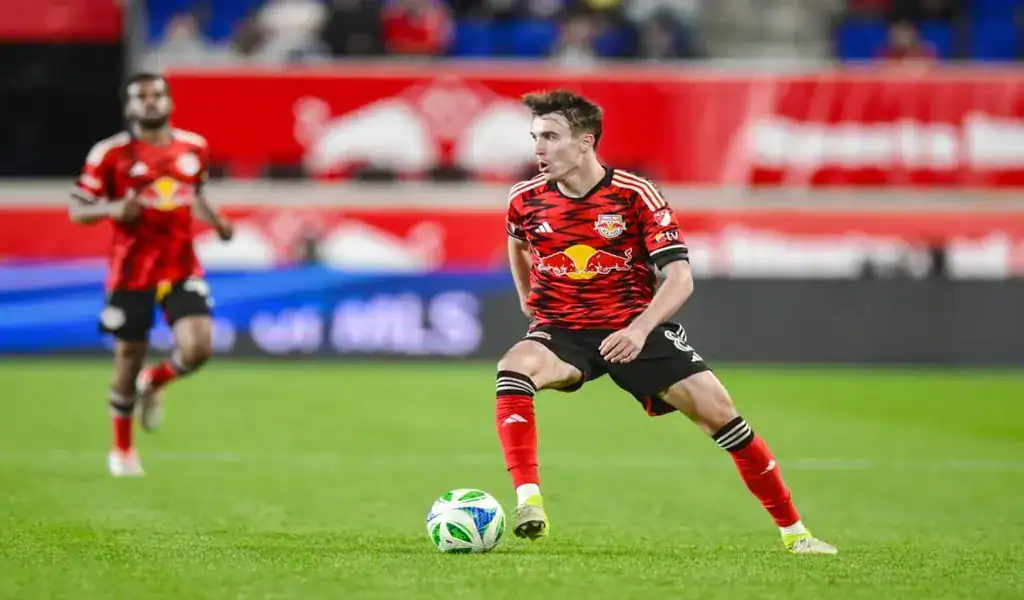 New York Red Bulls midfielder preparing to make a play during a match against Philadelphia Union